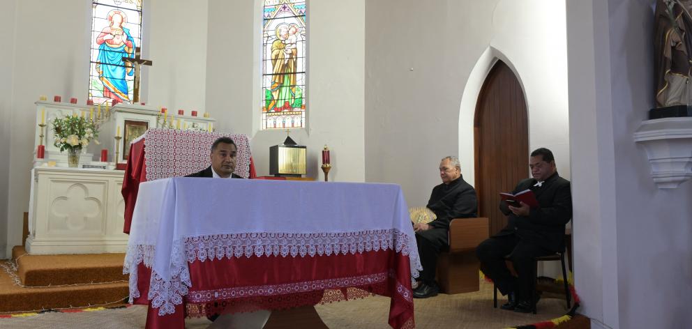Addressing the congregation at a Free Church of Tonga service held at Sacred Heart Church in...