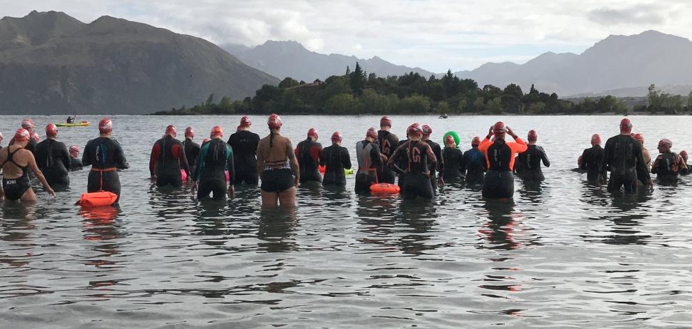 Starters line up for the 2.5km Iron Ruby at the Ruby Swim event in Wanaka at the weekend. 