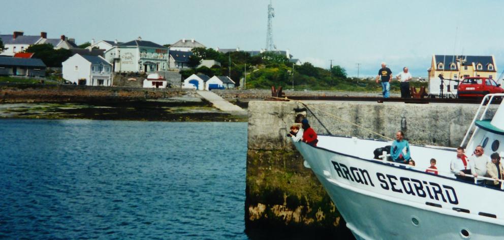 Passenger ferry Aran Seabird docks at Kilronan, Inishmore.