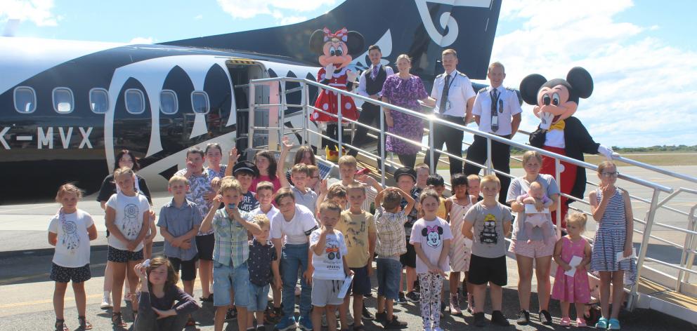 About 30 children living with different illnesses or disabilities took to the skies with their...