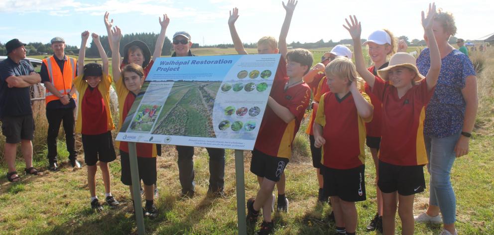 James Hargest College pupils, some of whom had volunteered to help plant, with the Waihōpai...