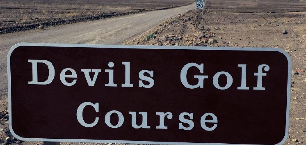 Devils Golf Course, Death Valley, where gnarled crystalline salt spires dot the landscape. PHOTOS...