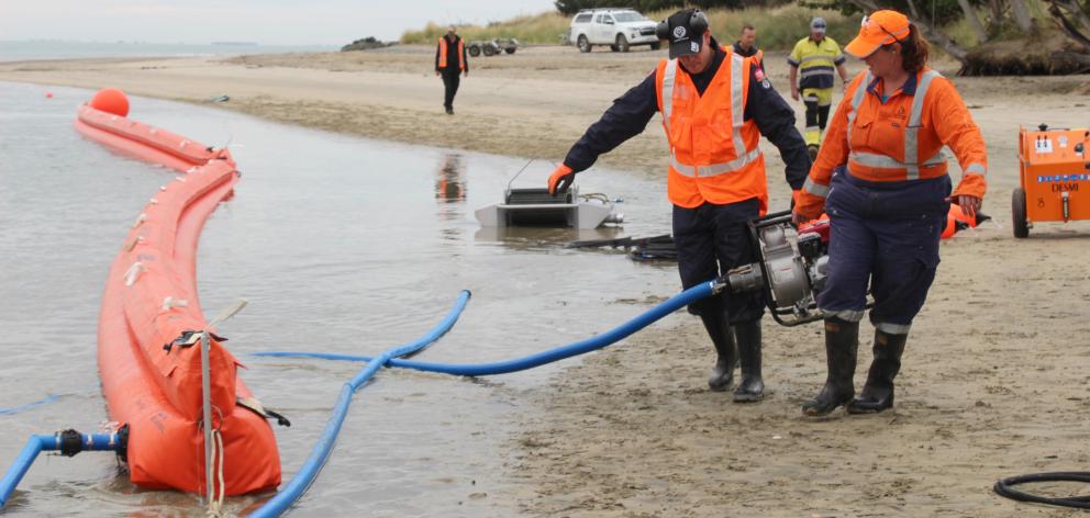 Jason ten Hoorn Boer from Fenz works with Stacey Stuart from Environment Southland at the marine...