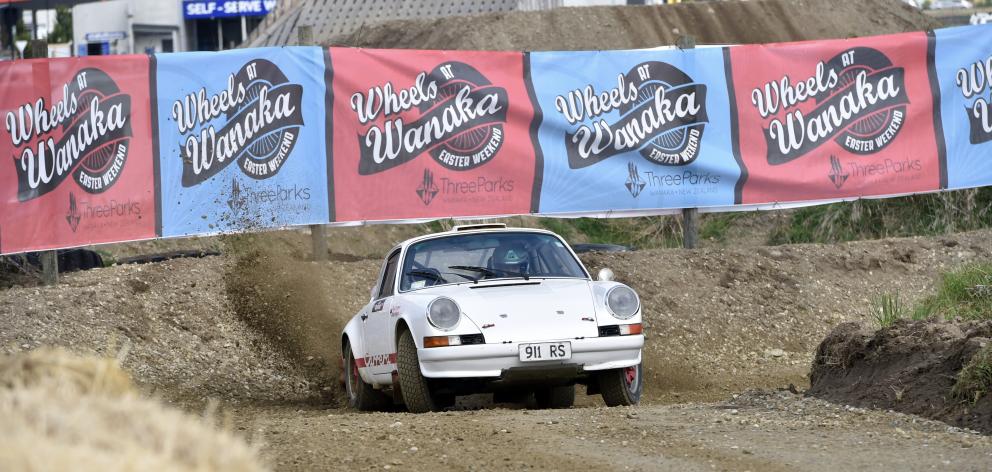 Rally hotshot Ari Pettigrew pilots a valuable and rare 1974 Porsche Carrera RS around a dirt...