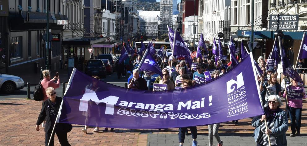 Hundreds of Dunedin nurses and their supporters march up Lower Stuart St towards the Octagon on...