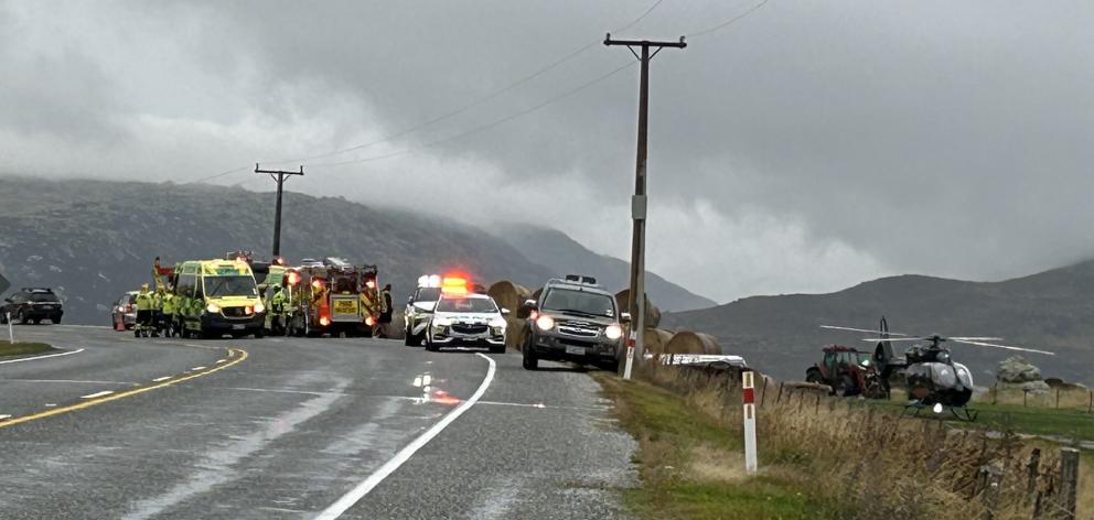 Emergency services - including a rescue helicopter - at the scene of a crash near Roxburgh. Photo...