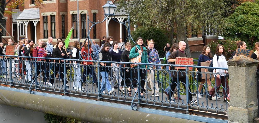 Otago University students march against underfunding and cuts yesterday. PHOTO: STEPHEN JAQUIERY