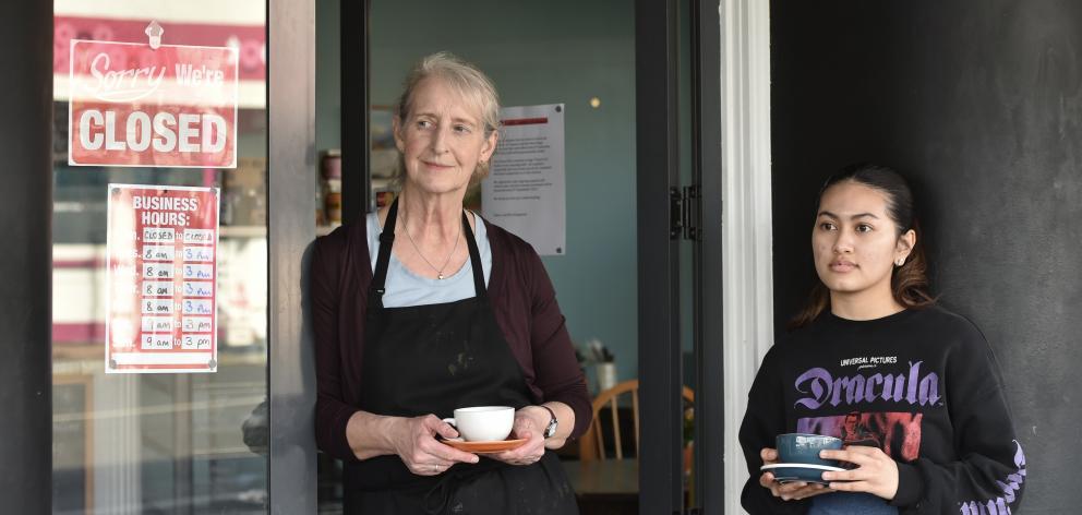 Illys Cafe owner Hilary Illingworth (left) and staff member Amira Shazeli ponder the future as...
