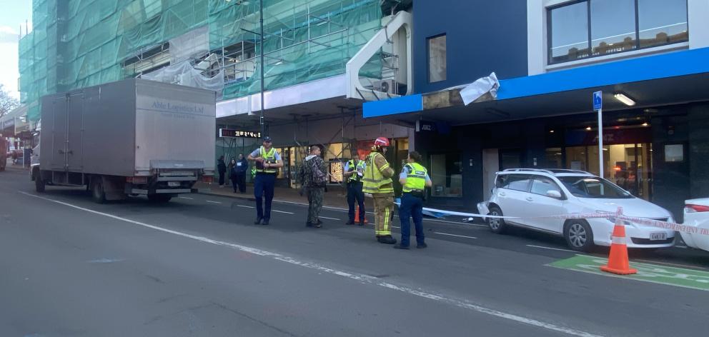 Emergency services at the scene with the truck following the accident. PHOTO: CRAIG BAXTER