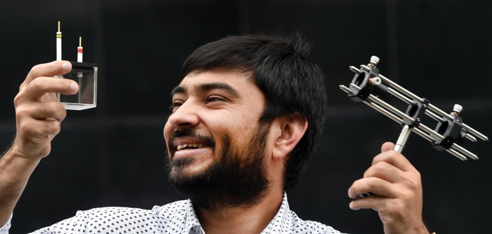 University of Otago physics PhD graduate Dr Mohsin Ijaz displays some of the equipment used in...