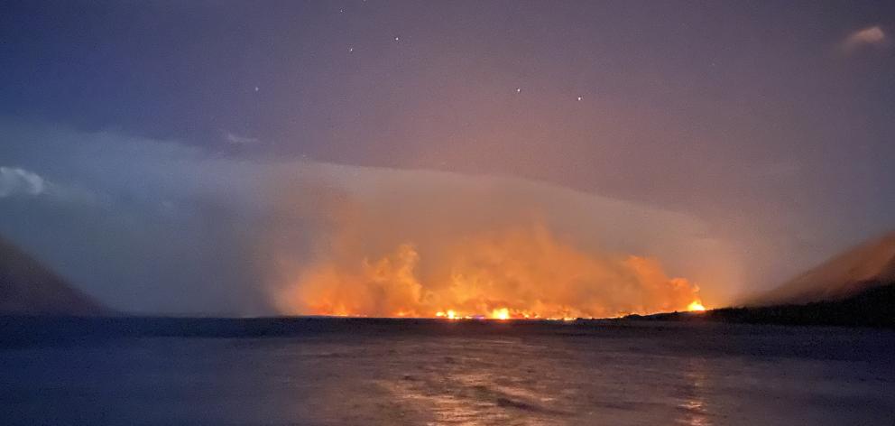 Fanned by severe winds, fire swept through Lake Ohau village and burned more than 5500ha, razing...