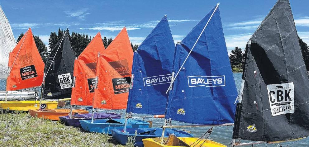 Learn-to-Sail Optimists sporting the new sails from local businesses. PHOTO: SUPPLIED