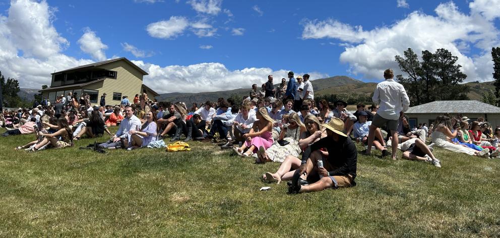 The crowd at the Cromwell races enjoy the fine weather yesterday.