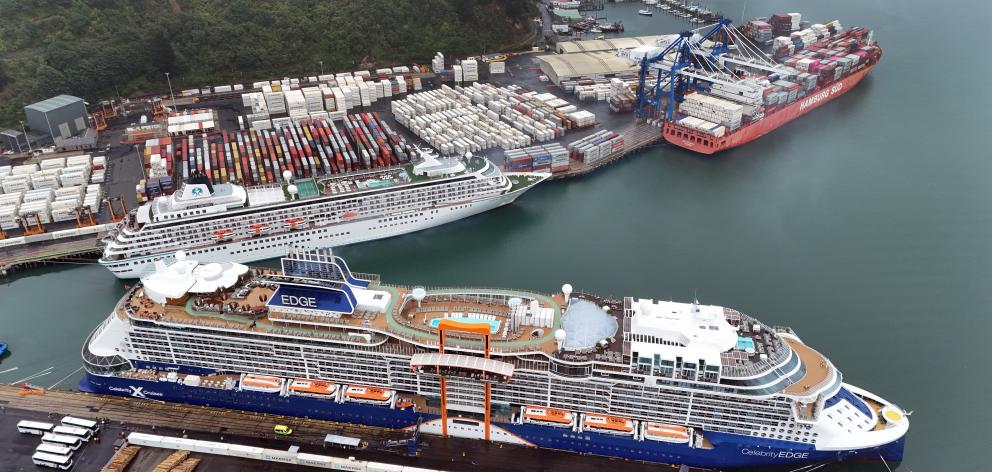 The two cruise ships berthed at Port Chalmers yesterday, Crystal Symphony (back) and Celebrity...