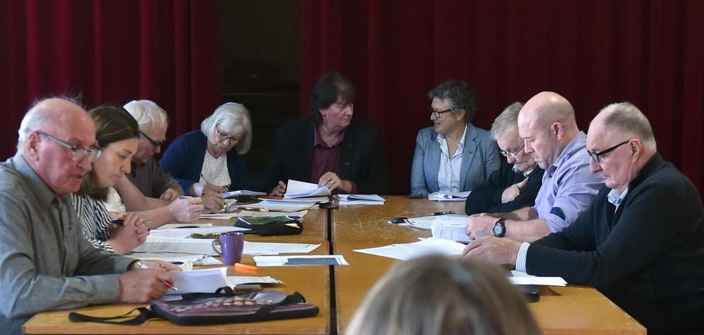 Strath Taieri Community Board members, including Robin Thomas (left), meet at Hyde. Other people...