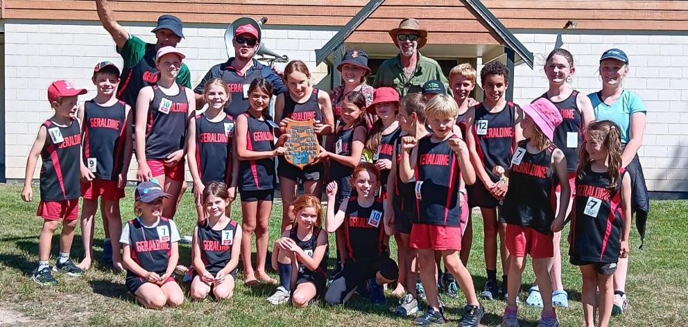 The Geraldine Athletics squad celebrate after successfully retaining the Rose Shield. PHOTOS:...
