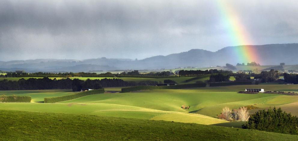 Rain starts to encroach on a sunny South Otago day near Warepa. PHOTO: STEPHEN JAQUIERY