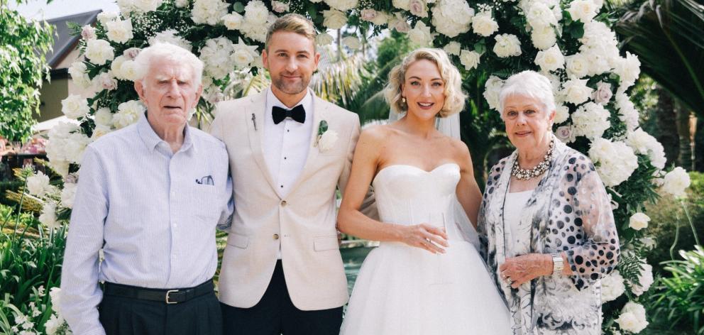 Holly Shervey and Emmett Skilton on their wedding day with her grandparents, Warren and Lorraine...