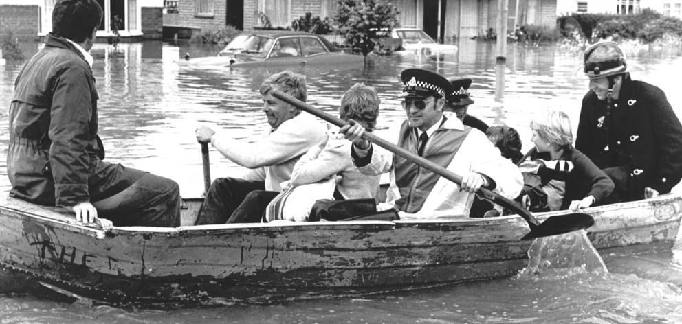 Grasmere residents being rescued by rowboat during the 1984 floods. PHOTO: FILE


