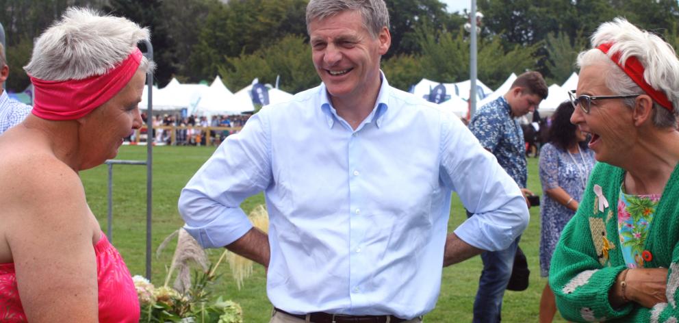 Dames Lynda and Jools Topp with former prime minister Bill English at the 2017 Wānaka A&P Show,...