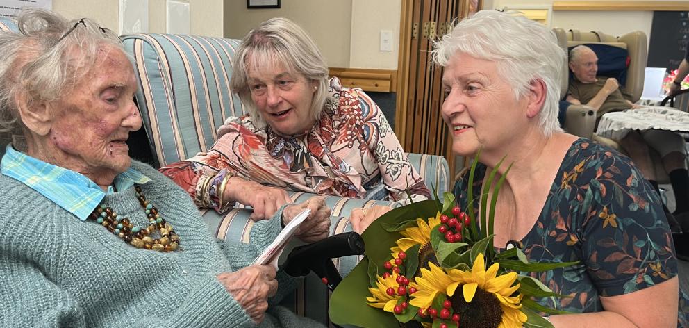 Margaret Reid receiving 100th birthday wishes from local RSA support adviser Diane McIrvine,...