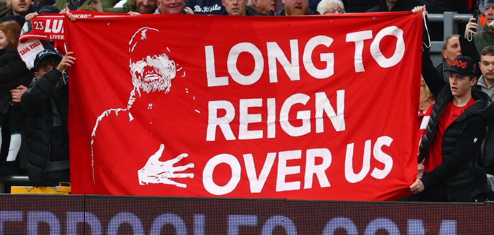 Liverpool fans display a Klopp banner. 