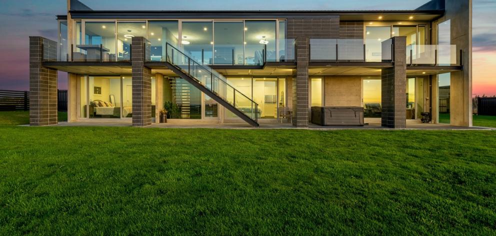 The sun sets at one of the properties on show at Ray White Home and Garden Invercargill Tour last...