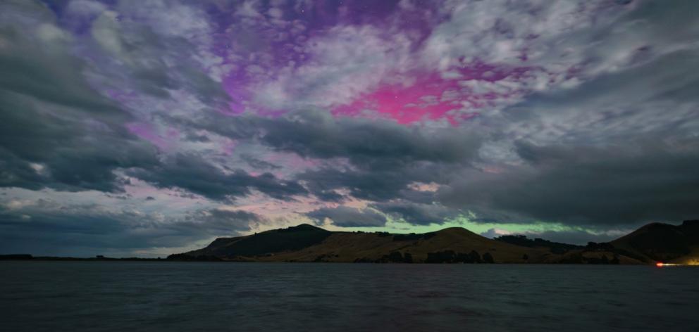 Despite a full moon, an aurora australis appears in the Dunedin sky early yesterday. PHOTO: IAN...