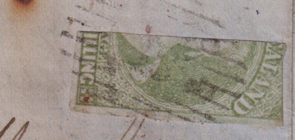 One half of a rare 1shilling full-face Queen Victoria stamp is up for auction at Mowbray...