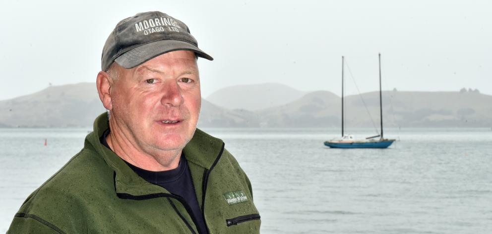 Moorings Otago Ltd owner, Kevin Waters, looks out at the abandoned yacht. PHOTO: GREGOR RICHARDSON