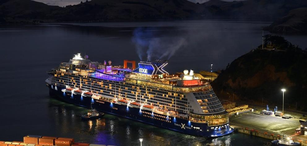 A smattering of cabin lights are on as Celebrity Edge, the penultimate cruise ship for the season...