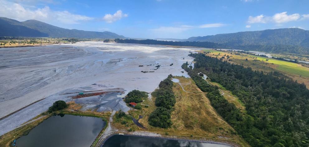 With the wastewater treatment plant, bottom, the course of the Waiho River can be seen swinging...