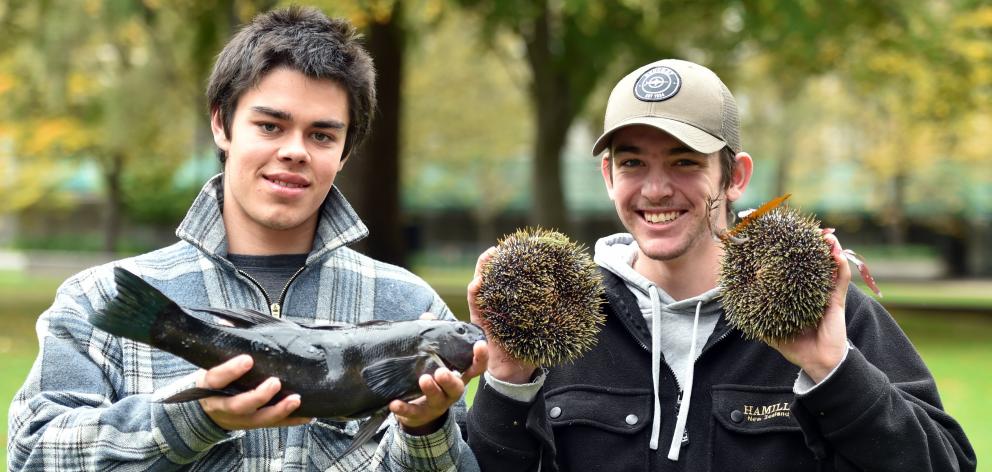 Club members Ponui McConachy (left), of Auckland, and Thomas Garbes, of Picton, hold up their...