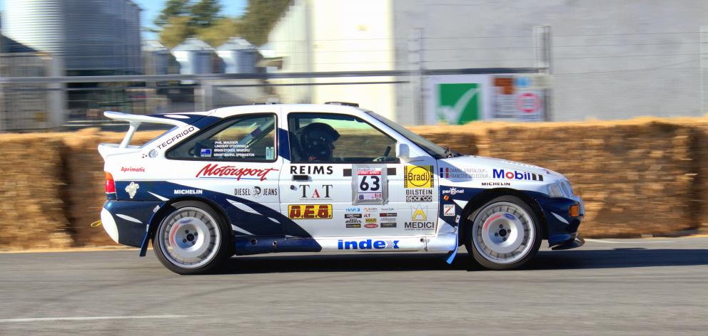 Phil Mauger behind the wheel of his 1995 Ford Escort RS Cosworth at the Ashburton Street Sprints...