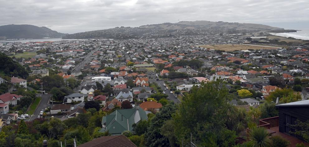 The flat, low-lying suburb of South Dunedin is surrounded by a harbour, the Pacific Ocean and...