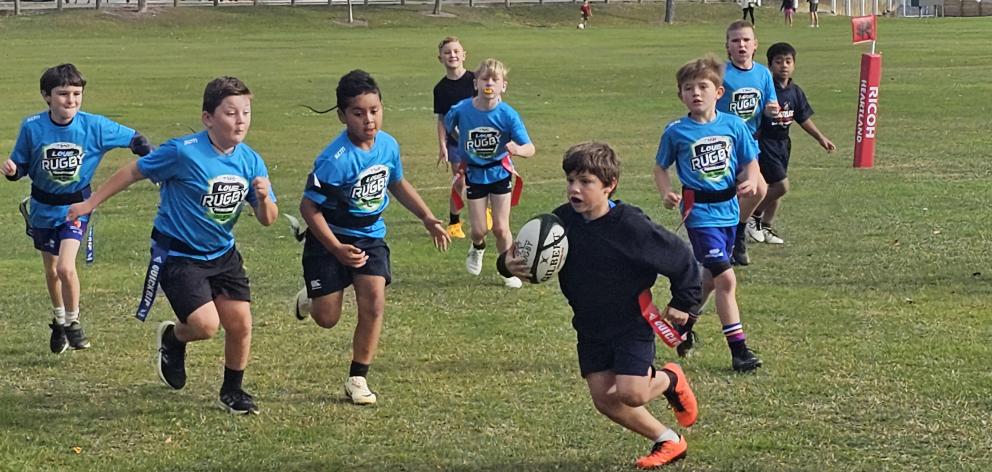 Luke makes a dart to the tryline as part of the South Canterbury Rugby holiday programme.