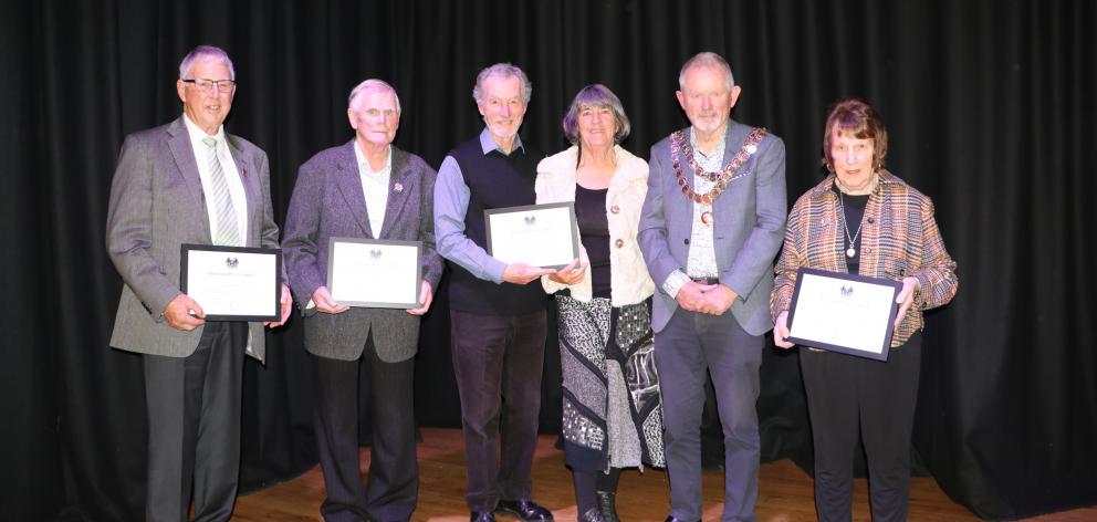 Receiving their Invercargill City Council Civic Honours Awards recently are (from left) John...