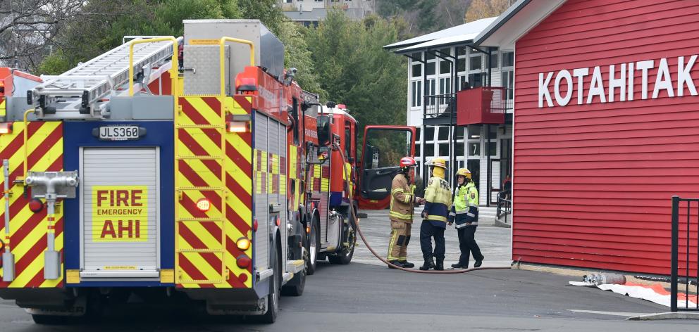 Firefighters deal with a hazardous substance spill caused by a pupil’s science project at Dunedin...