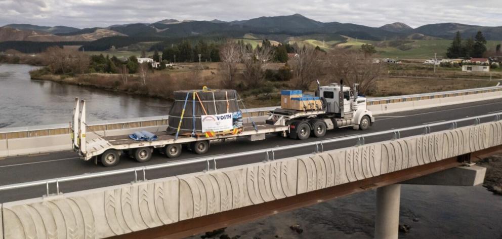 Four new turbines are being installed at the Roxburgh Dam. Below: The dam. PHOTOS: CONTACT ENERGY