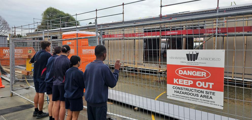 Checking out the progress of the new classrooms at Sacred Heart Primary School are pupils (from...
