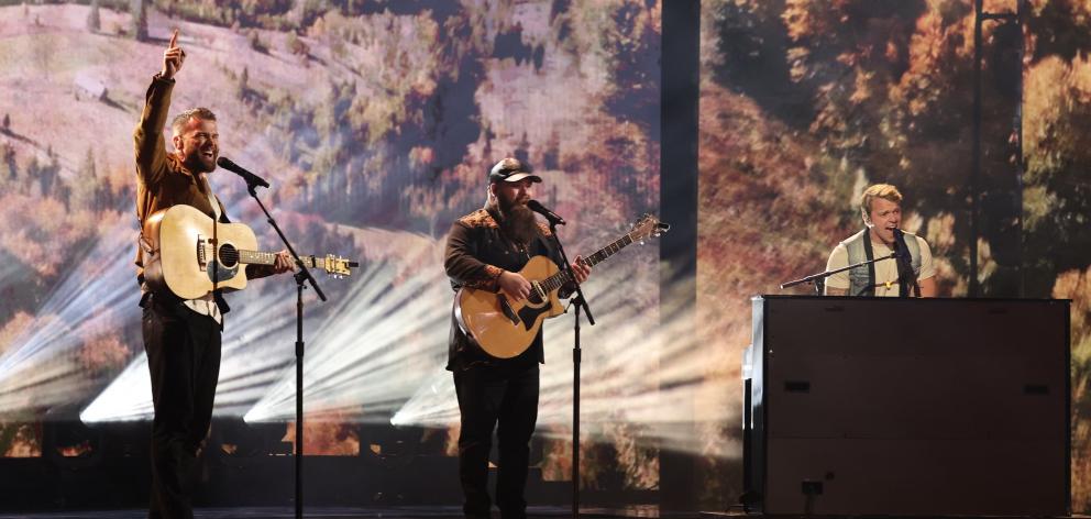 Ashes & Arrows’ Ciaran McMeeken, left, with Jonathan Calhoun, centre, and Benjamin Voigt, perform...