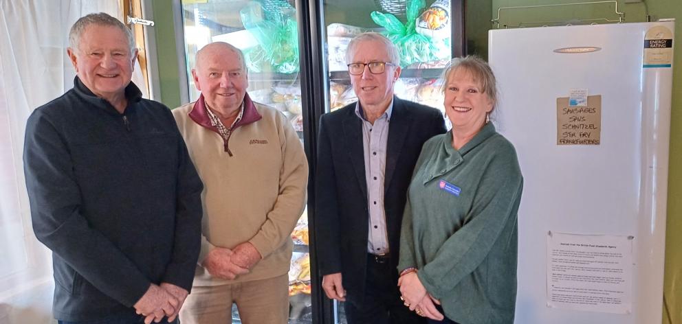 Rotary Club of Gore treasurer Graeme Lynn (left), president Russell Welsh (second from left) and...