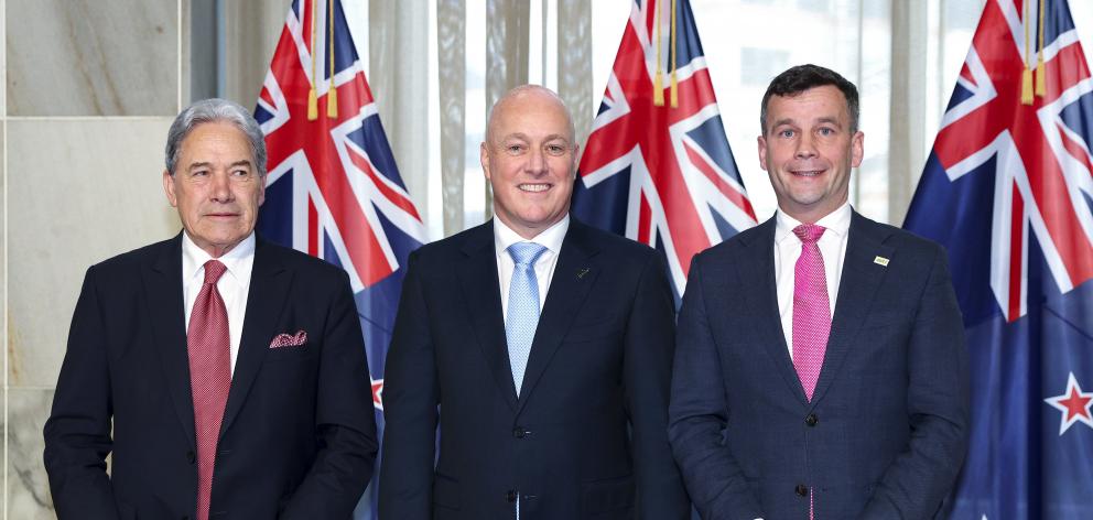 The leaders of the three parties that make up New Zealand's current coalition government, from...