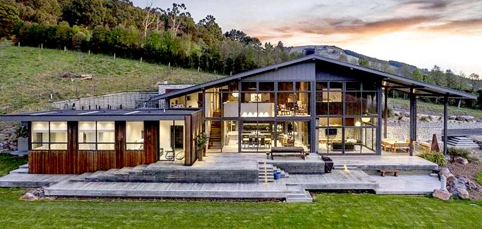 The luxury five-bedroom, three-bathroom mountain lodge-style home on Heaton Drive, Tai Tapu, is...