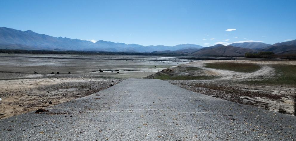 Lake Opuha experienced near record low water levels last March after a dry summer. PHOTO: CLARE...