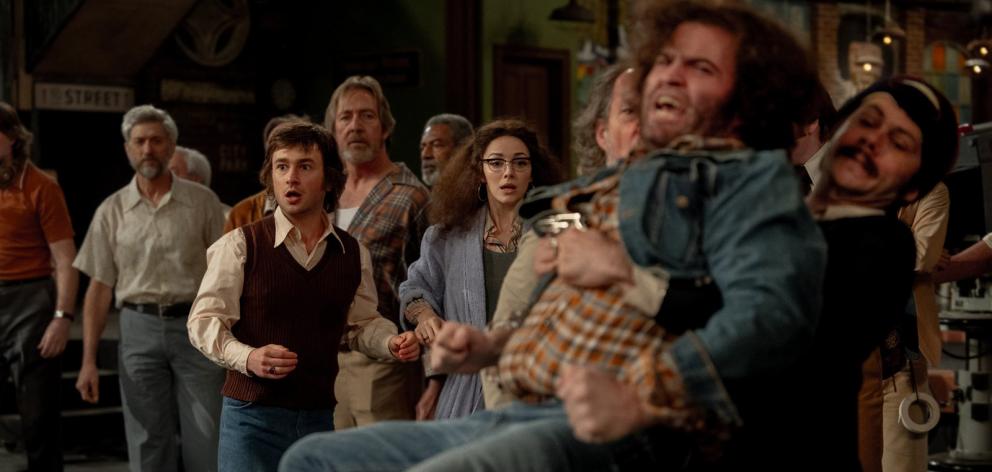 From left, Lorne Michaels (Gabriel LaBelle), Gilda Radner (Ella Hunt), John Belushi (Matt Wood),...