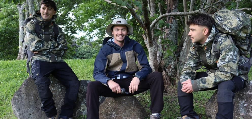 Three friends, from left, Alex Smith, Tane Tarlton-Kraus and Ben Reeve, will be walking coast to...
