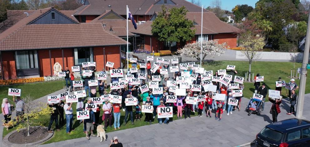 A drone image showing protestors on the Waimakariri District Council lawn in Rangiora in...