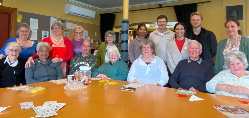 Members of the Senior Link group, leaders Rosie Cockburn and Geraldine Tait (in purple and green,...