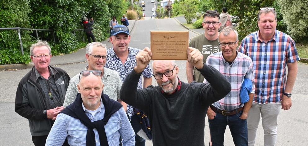 Celebrating the acknowledgement of Dunedin surveyor Toby Stoff’s (centre) work to reclaim Baldwin...